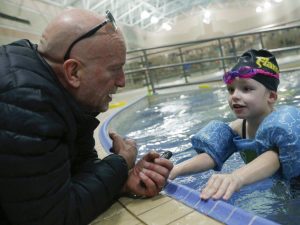 A photo of Mike and Madi in the pool 