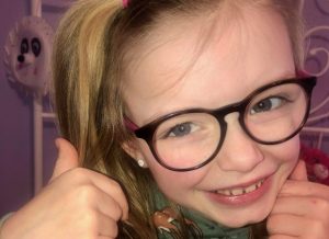 Madison "Madi" Ambos, 7, is all smiles after the Sun Christmas Fund, of which she is 'chairkid,' raised more than $75,000 for Variety Village. PHOTO BY KATHERINE AMBOS /Submitted