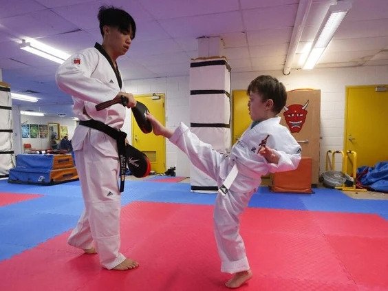 Marshall Ku cannot raise his arms above his head or make a fist, which you’d think would rule out martial arts. Not at Variety Village, it doesn't.